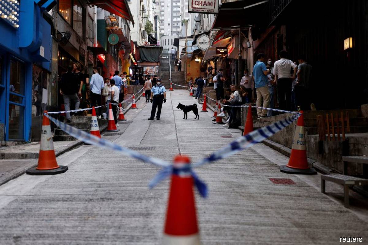 Hong Kong considers shorter Covid quarantine for travellers — Lee